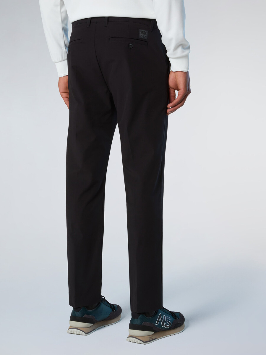 calças chino defender de corte slim
